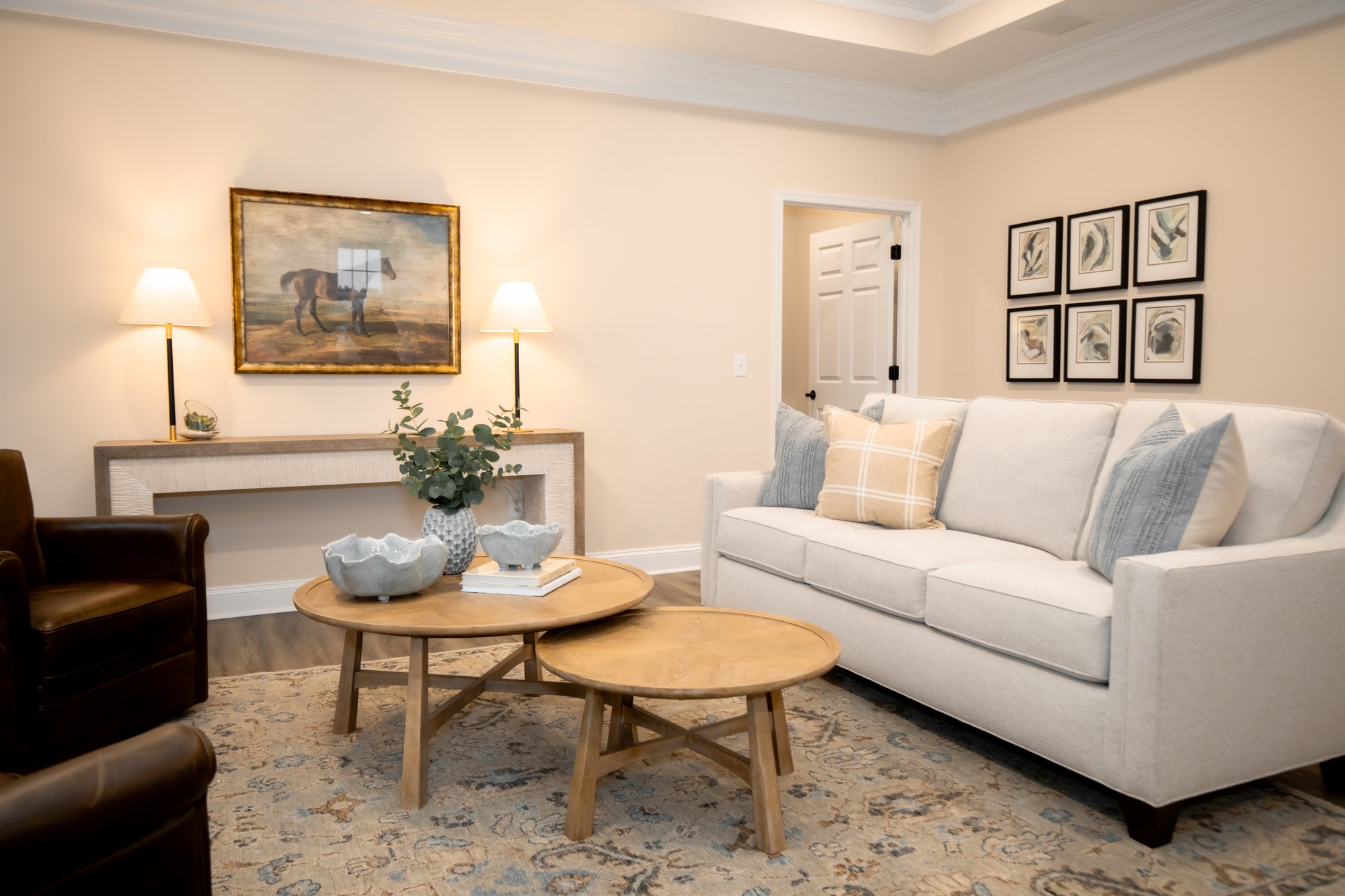 Great Room with equestrian art