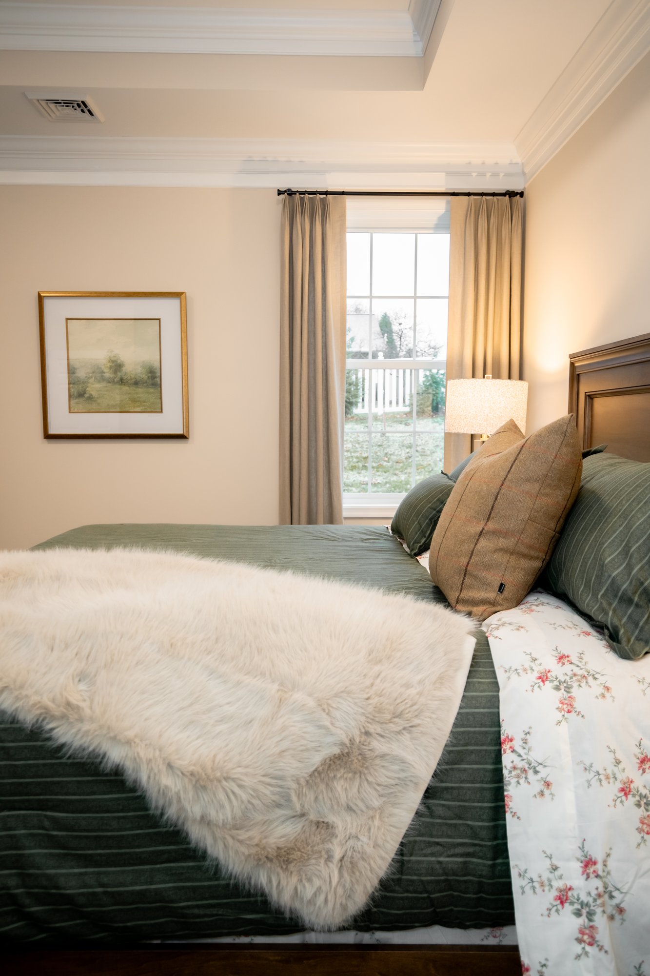 Primary bedroom with crown molding